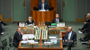 Australia's Prime Minister Anthony Albanese (Front L) sits across from opposition leader Peter Dutton (Front R) during Question Time at Parliament House on May 14, 2024 in Canberra, Australia.