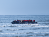 A refugee boat sets off to cross the English Channel in Wimereux, northern France in April 2025.