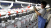 A worker is producing products at a cloth manufacturing enterprise in Binzhou, China