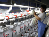 A worker is producing products at a cloth manufacturing enterprise in Binzhou, China