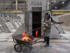 A worker in the electrolysis sector at the Aluminum Dunkerque SAS aluminium smelter near Dunkirk, France, on Monday, March 17, 2025.