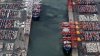 An aerial photo taken on 27 June, 2024 shows cargo ships at the Port of Melbourne, Australia's largest container port, in Melbourne.
