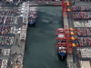 An aerial photo taken on 27 June, 2024 shows cargo ships at the Port of Melbourne, Australia's largest container port, in Melbourne.