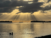 Nuku'alofa, Tonga, August 2025. Children play in the ocean at sunrise.