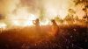 A Manggala Agni firefighter works to extinguish a land fire in Ogan Ilir Regency, South Sumatra, Indonesia, on August 15, 2026.